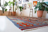 Vintage kilim rug in living room setting, bright colors, wild shaman, soft rug, bold color, Portland, Oregon, rug store, rug shop, local shop, vintage rug, modern kilim, warm colors