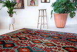 Vintage kilim rug in living room setting, bright colors, wild shaman, soft rug, bold color, Portland, Oregon, rug store, rug shop, local shop, vintage rug, modern kilim, warm colors