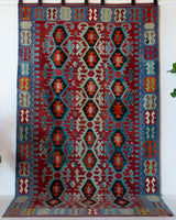 Vintage kilim rug in living room setting, bright colors, wild shaman, soft rug, bold color, Portland, Oregon, rug store, rug shop, local shop, vintage rug, modern kilim, warm colors