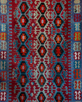 Vintage kilim rug in living room setting, bright colors, wild shaman, soft rug, bold color, Portland, Oregon, rug store, rug shop, local shop, vintage rug, modern kilim, warm colors