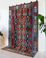 Vintage kilim rug in living room setting, bright colors, wild shaman, soft rug, bold color, Portland, Oregon, rug store, rug shop, local shop, vintage rug, modern kilim, warm colors