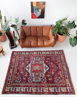 Vintage Turkish rug in a living room setting, pile rug, Turkish rug, vintage rug, portland, rug shop, bright colors, wild shaman, soft rug, bold color, Portland, Oregon, rug store, rug shop, local shop, antique rug