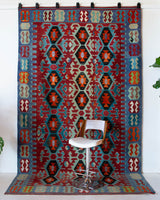 Vintage kilim rug in living room setting, bright colors, wild shaman, soft rug, bold color, Portland, Oregon, rug store, rug shop, local shop, vintage rug, modern kilim, warm colors