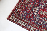Vintage Turkish rug in a living room setting, pile rug, Turkish rug, vintage rug, portland, rug shop, bright colors, wild shaman, soft rug, bold color, Portland, Oregon, rug store, rug shop, local shop, antique rug