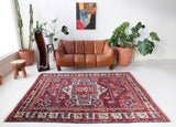Vintage Turkish rug in a living room setting, pile rug, Turkish rug, vintage rug, portland, rug shop, bright colors, wild shaman, soft rug, bold color, Portland, Oregon, rug store, rug shop, local shop, antique rug