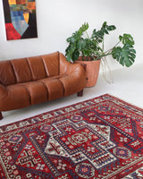 Vintage Turkish rug in a living room setting, pile rug, Turkish rug, vintage rug, portland, rug shop, bright colors, wild shaman, soft rug, bold color, Portland, Oregon, rug store, rug shop, local shop, antique rug