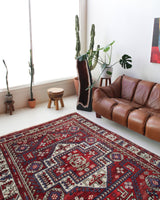 Vintage Turkish rug in a living room setting, pile rug, Turkish rug, vintage rug, portland, rug shop, bright colors, wild shaman, soft rug, bold color, Portland, Oregon, rug store, rug shop, local shop, antique rug