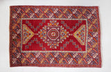 Vintage Turkish rug in a living room setting, pile rug, Turkish rug, vintage rug, portland, rug shop, bright colors, wild shaman, soft rug, bold color, Portland, Oregon, rug store, rug shop, local shop, antique rug