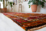 Vintage Turkish runner rug in a living room setting, pile rug, Turkish rug, vintage rug, portland, rug shop, bright colors, wild shaman, soft rug, bold color, Portland, Oregon, rug store, rug shop, local shop, antique rug