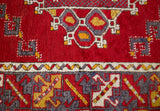 Vintage Turkish rug in a living room setting, pile rug, Turkish rug, vintage rug, portland, rug shop, bright colors, wild shaman, soft rug, bold color, Portland, Oregon, rug store, rug shop, local shop, antique rug