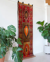 Vintage Turkish runner rug in a living room setting, pile rug, Turkish rug, vintage rug, portland, rug shop, bright colors, wild shaman, soft rug, bold color, Portland, Oregon, rug store, rug shop, local shop, antique rug