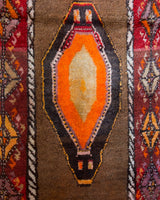 Vintage Turkish runner rug in a living room setting, pile rug, Turkish rug, vintage rug, portland, rug shop, bright colors, wild shaman, soft rug, bold color, Portland, Oregon, rug store, rug shop, local shop, antique rug