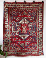 Vintage Turkish rug in a living room setting, pile rug, Turkish rug, vintage rug, portland, rug shop, bright colors, wild shaman, soft rug, bold color, Portland, Oregon, rug store, rug shop, local shop, antique rug