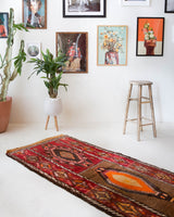 Vintage Turkish runner rug in a living room setting, pile rug, Turkish rug, vintage rug, portland, rug shop, bright colors, wild shaman, soft rug, bold color, Portland, Oregon, rug store, rug shop, local shop, antique rug
