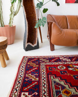 Vintage Turkish rug in a living room setting, pile rug, Turkish rug, vintage rug, portland, rug shop, bright colors, wild shaman, soft rug, bold color, Portland, Oregon, rug store, rug shop, local shop, antique rug