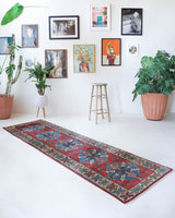 Vintage Turkish runner rug in a living room setting, pile rug, Turkish rug, vintage rug, portland, rug shop, bright colors, wild shaman, soft rug, bold color, Portland, Oregon, rug store, rug shop, local shop, antique rug