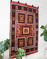 Vintage Turkish rug in a living room setting, pile rug, Turkish rug, vintage rug, portland, rug shop, bright colors, wild shaman, soft rug, bold color, Portland, Oregon, rug store, rug shop, local shop, antique rug