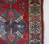 Vintage Turkish runner rug in a living room setting, pile rug, Turkish rug, vintage rug, portland, rug shop, bright colors, wild shaman, soft rug, bold color, Portland, Oregon, rug store, rug shop, local shop, antique rug