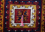 Vintage Turkish rug in a living room setting, pile rug, Turkish rug, vintage rug, portland, rug shop, bright colors, wild shaman, soft rug, bold color, Portland, Oregon, rug store, rug shop, local shop, antique rug