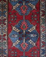 Vintage Turkish runner rug in a living room setting, pile rug, Turkish rug, vintage rug, portland, rug shop, bright colors, wild shaman, soft rug, bold color, Portland, Oregon, rug store, rug shop, local shop, antique rug