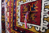 Vintage Turkish rug in a living room setting, pile rug, Turkish rug, vintage rug, portland, rug shop, bright colors, wild shaman, soft rug, bold color, Portland, Oregon, rug store, rug shop, local shop, antique rug
