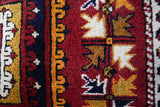 Vintage Turkish rug in a living room setting, pile rug, Turkish rug, vintage rug, portland, rug shop, bright colors, wild shaman, soft rug, bold color, Portland, Oregon, rug store, rug shop, local shop, antique rug