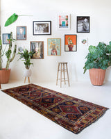 Vintage Turkish runner rug in a living room setting, pile rug, Turkish rug, vintage rug, portland, rug shop, bright colors, wild shaman, soft rug, bold color, Portland, Oregon, rug store, rug shop, local shop, antique rug
