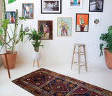 Vintage Turkish runner rug in a living room setting, pile rug, Turkish rug, vintage rug, portland, rug shop, bright colors, wild shaman, soft rug, bold color, Portland, Oregon, rug store, rug shop, local shop, antique rug