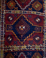 Vintage Turkish runner rug in a living room setting, pile rug, Turkish rug, vintage rug, portland, rug shop, bright colors, wild shaman, soft rug, bold color, Portland, Oregon, rug store, rug shop, local shop, antique rug