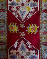 Vintage Turkish runner rug in a living room setting, pile rug, Turkish rug, vintage rug, portland, rug shop, bright colors, wild shaman, soft rug, bold color, Portland, Oregon, rug store, rug shop, local shop, antique rug