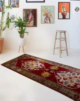 Vintage Turkish runner rug in a living room setting, pile rug, Turkish rug, vintage rug, portland, rug shop, bright colors, wild shaman, soft rug, bold color, Portland, Oregon, rug store, rug shop, local shop, antique rug
