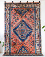 Vintage Turkish rug in living room setting, old rug, antique rug, pastel colors, faded colors, Turkish rug, vintage rug, soft rug, Portland, Oregon, rug store, rug shop, local shop, pastel colors