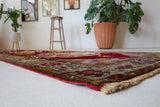 Vintage Turkish runner rug in a living room setting, pile rug, Turkish rug, vintage rug, portland, rug shop, bright colors, wild shaman, soft rug, bold color, Portland, Oregon, rug store, rug shop, local shop, antique rug