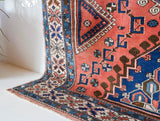Vintage Turkish rug in living room setting, old rug, antique rug, pastel colors, faded colors, Turkish rug, vintage rug, soft rug, Portland, Oregon, rug store, rug shop, local shop, pastel colors