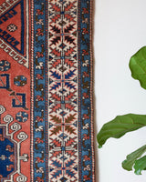 Vintage Turkish rug in living room setting, old rug, antique rug, pastel colors, faded colors, Turkish rug, vintage rug, soft rug, Portland, Oregon, rug store, rug shop, local shop, pastel colors