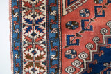Vintage Turkish rug in living room setting, old rug, antique rug, pastel colors, faded colors, Turkish rug, vintage rug, soft rug, Portland, Oregon, rug store, rug shop, local shop, pastel colors
