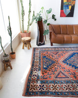 Vintage Turkish rug in living room setting, old rug, antique rug, pastel colors, faded colors, Turkish rug, vintage rug, soft rug, Portland, Oregon, rug store, rug shop, local shop, pastel colors