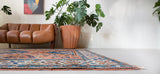 Vintage Turkish rug in living room setting, old rug, antique rug, pastel colors, faded colors, Turkish rug, vintage rug, soft rug, Portland, Oregon, rug store, rug shop, local shop, pastel colors