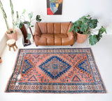 Vintage Turkish rug in living room setting, old rug, antique rug, pastel colors, faded colors, Turkish rug, vintage rug, soft rug, Portland, Oregon, rug store, rug shop, local shop, pastel colors