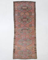 Vintage Turkish runner rug in living room setting, old rug, antique rug, pastel colors, faded colors, Turkish rug, vintage rug, soft rug, Portland, Oregon, rug store, rug shop, local shop