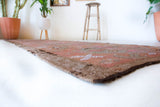 Vintage Turkish runner rug in living room setting, old rug, antique rug, pastel colors, faded colors, Turkish rug, vintage rug, soft rug, Portland, Oregon, rug store, rug shop, local shop