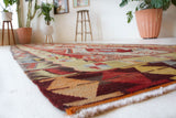 Vintage Turkish runner rug in a living room setting, pile rug, Turkish rug, vintage rug, portland, rug shop, bright colors, wild shaman, soft rug, bold color, Portland, Oregon, rug store, rug shop, local shop, antique rug