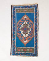 Vintage mini kilim rug in room decor setting, kilim, Turkish rug, vintage rug, portland, rug shop, bright colors, wild shaman, soft rug, bold color, Portland, Oregon, rug store, rug shop, local shop