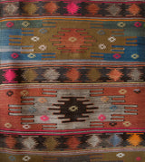 Vintage Turkish runner rug in a living room setting, pile rug, Turkish rug, vintage rug, portland, rug shop, bright colors, wild shaman, soft rug, bold color, Portland, Oregon, rug store, rug shop, local shop, antique rug