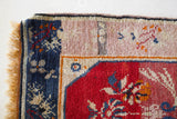 Vintage Turkish mini rug in room decor setting, old rug, antique rug, pastel colors, faded colors, Turkish rug, vintage rug, soft rug, Portland, Oregon, rug store, rug shop, local shop