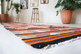 Vintage Turkish runner rug in a living room setting, pile rug, Turkish rug, vintage rug, portland, rug shop, bright colors, wild shaman, soft rug, bold color, Portland, Oregon, rug store, rug shop, local shop, antique rug
