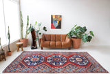 Vintage Turkish rug in a living room setting, pile rug, Turkish rug, vintage rug, portland, rug shop, bright colors, wild shaman, soft rug, bold color, Portland, Oregon, rug store, rug shop, local shop, antique rug