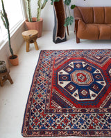 Vintage Turkish rug in a living room setting, pile rug, Turkish rug, vintage rug, portland, rug shop, bright colors, wild shaman, soft rug, bold color, Portland, Oregon, rug store, rug shop, local shop, antique rug