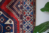 Vintage Turkish rug in a living room setting, pile rug, Turkish rug, vintage rug, portland, rug shop, bright colors, wild shaman, soft rug, bold color, Portland, Oregon, rug store, rug shop, local shop, antique rug