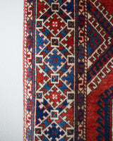 Vintage Turkish rug in a living room setting, pile rug, Turkish rug, vintage rug, portland, rug shop, bright colors, wild shaman, soft rug, bold color, Portland, Oregon, rug store, rug shop, local shop, antique rug